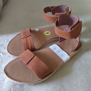 Cutest Reef sandals you'll ever see. Leather upper. Tan color. Size 9 NEW.